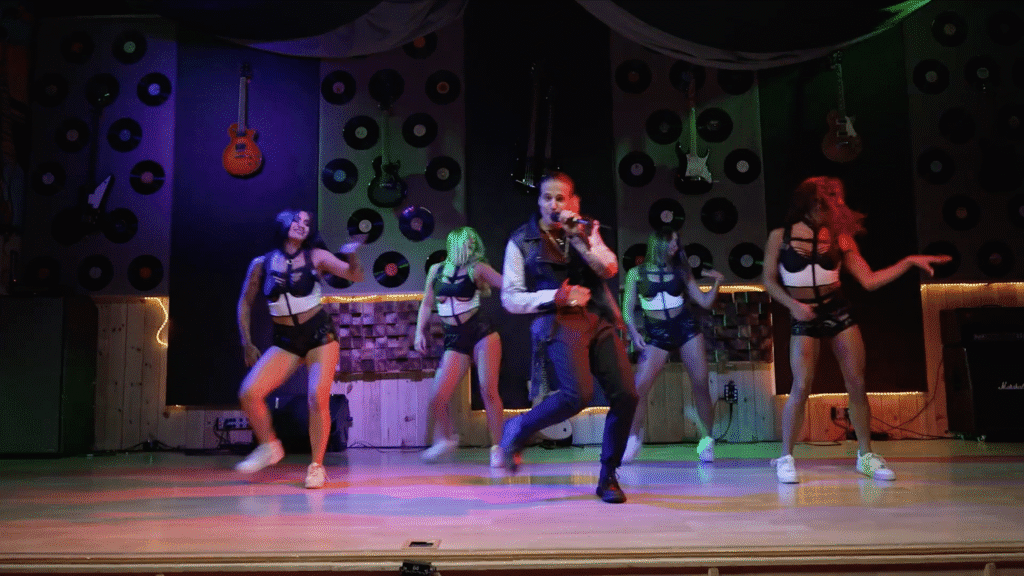 Video still from a live music and dance performance shoot