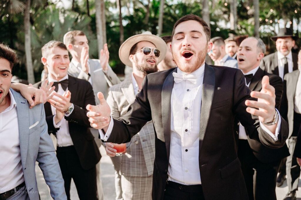 Commercial Video Production Hollywood FL highlighting groomsmen portraits.