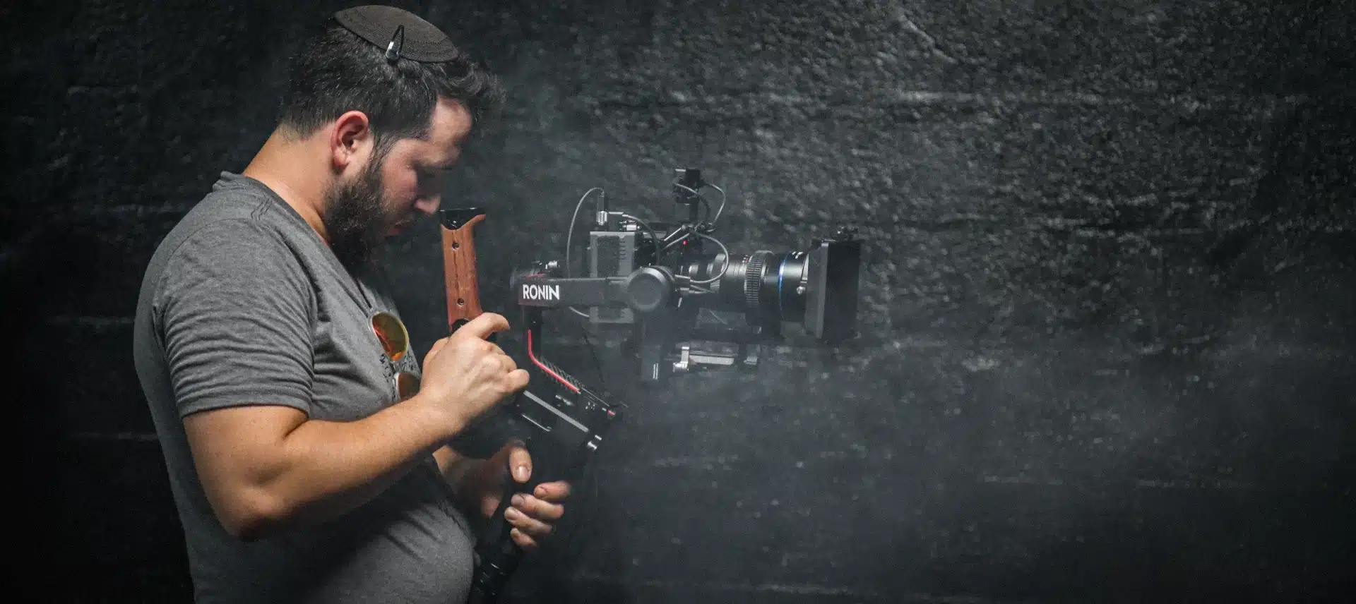 Dov Gurewicz filming with a Ronin camera rig