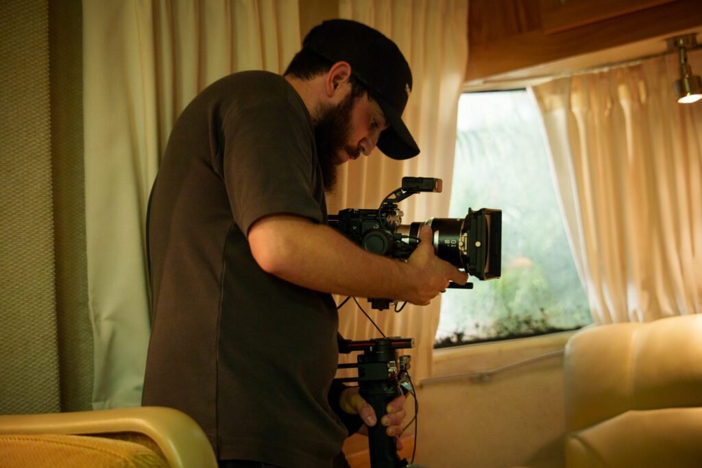 Dov Gurewicz filming inside an RV with a camera rig