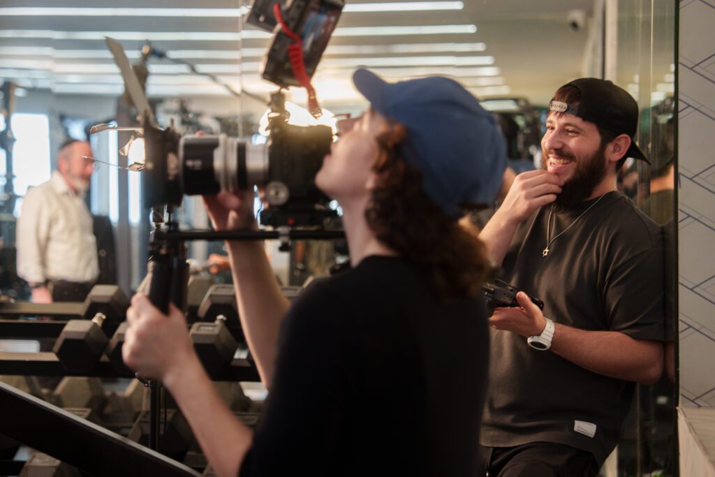 Filming in a gym setting.