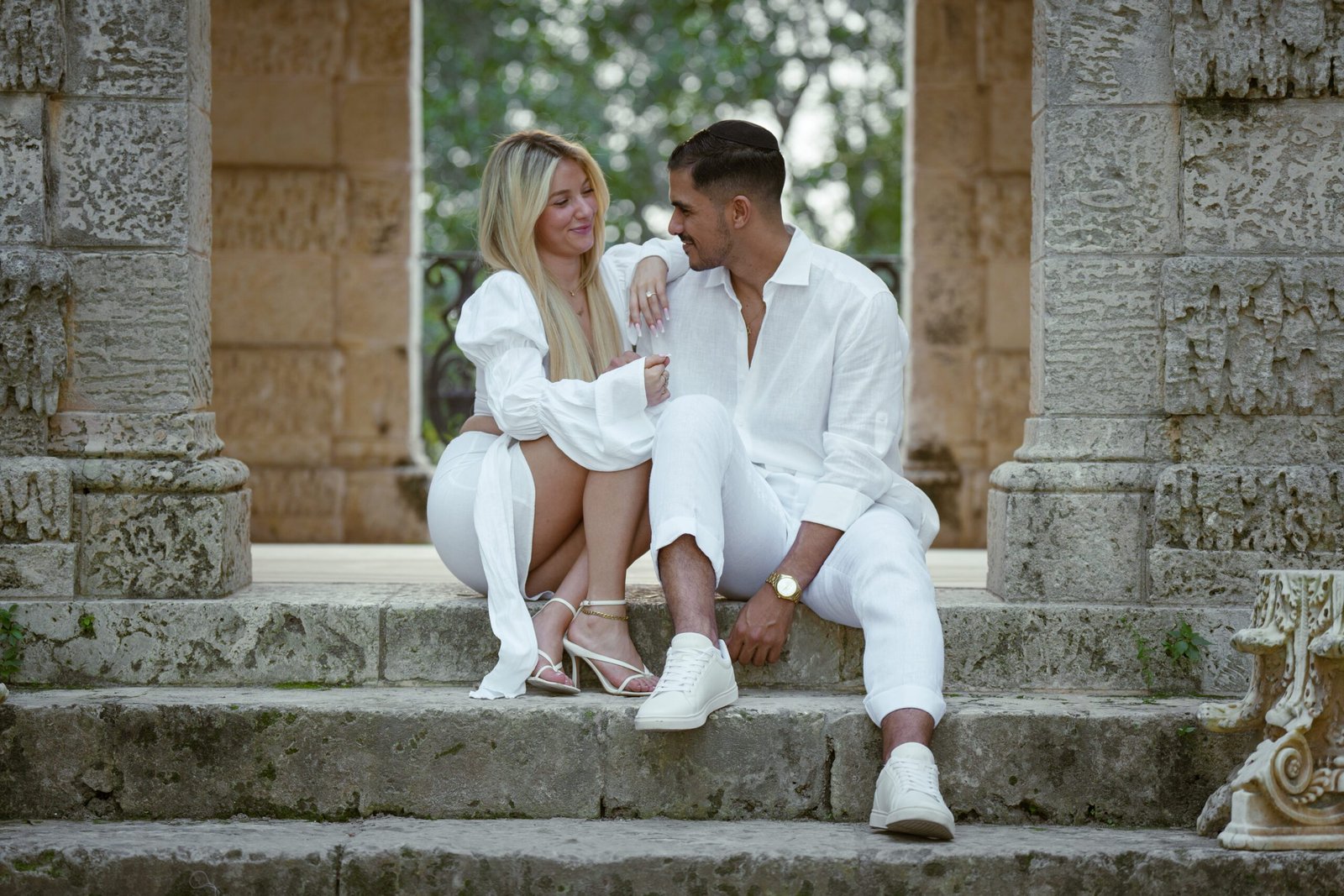 Bex and Dor embracing during their proposal at Vizcaya