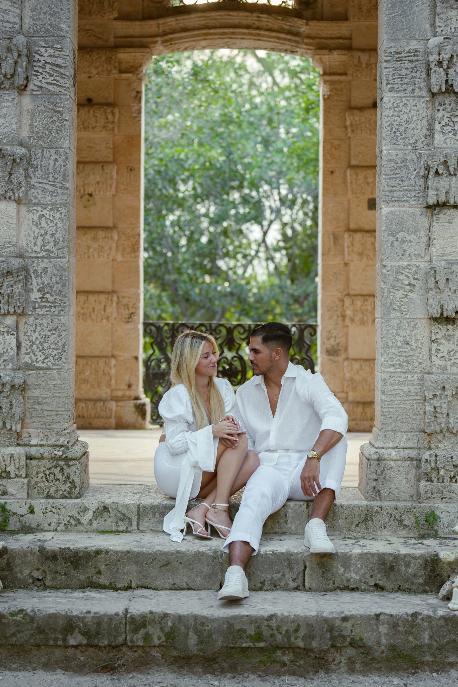 Bex and Dor posed under the coral archways at Vizcaya during their proposal session