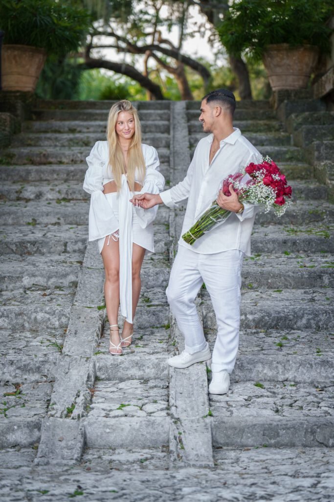 Bex and Dor laughing together during their Vizcaya proposal session