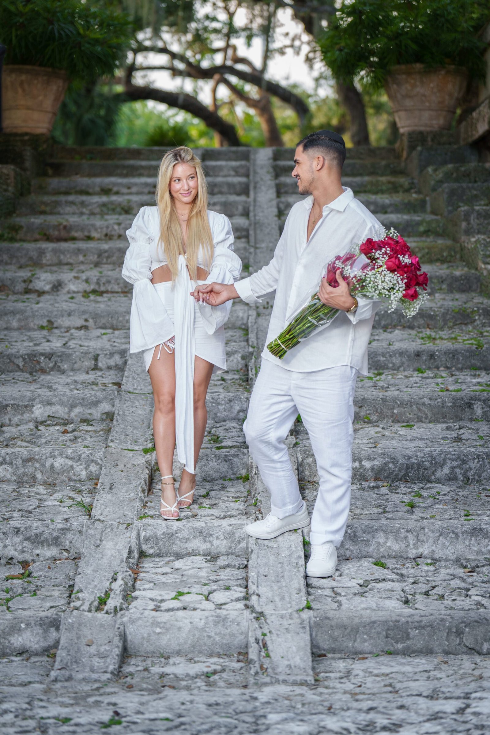 Bex and Dor laughing together during their Vizcaya proposal session