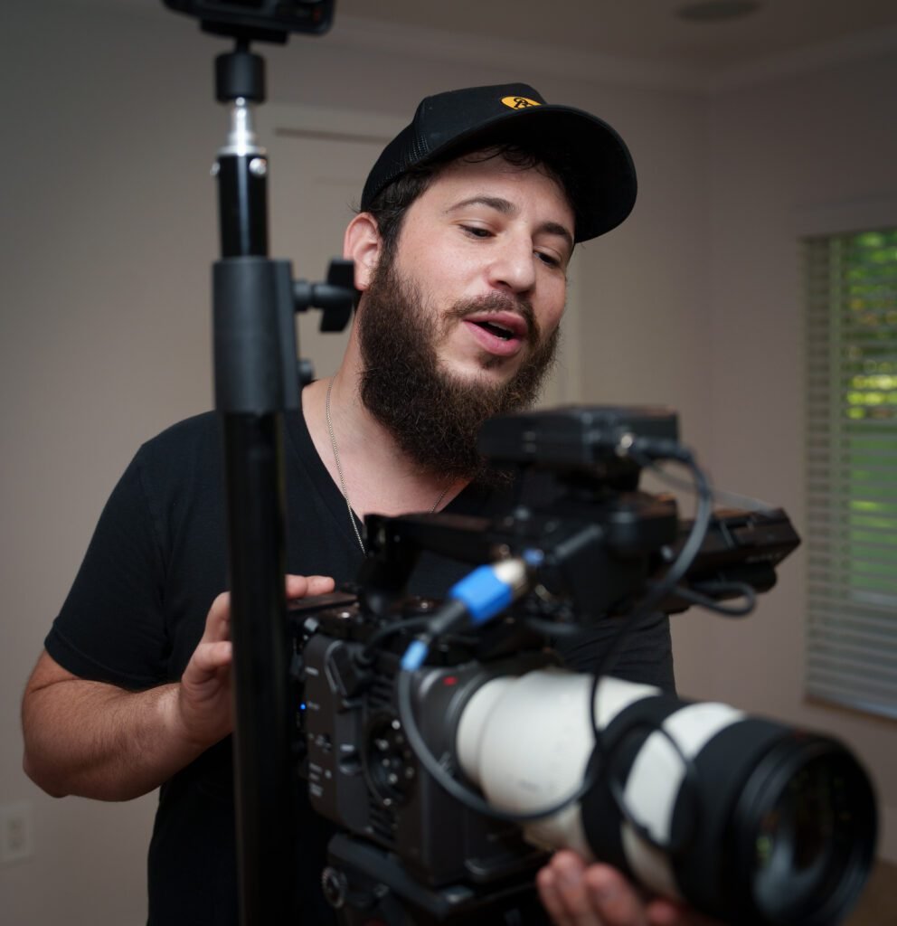 Dov Gurewicz filming with a Sony FX6 cinema camera