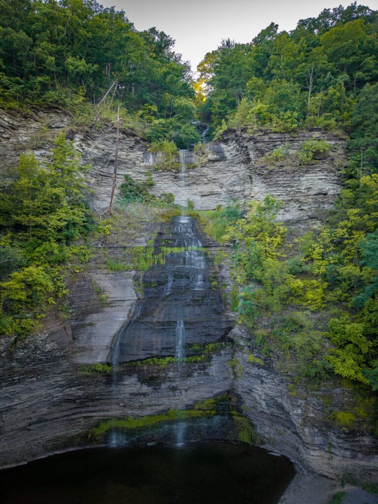 Aerial view of Aunt Sarah's Falls dropping in tiers down the shale cliff above Montour Falls, New York