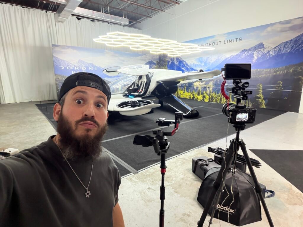 Dov Gurewicz in front of the full-scale Doroni H1-X with his camera rig set up behind him
