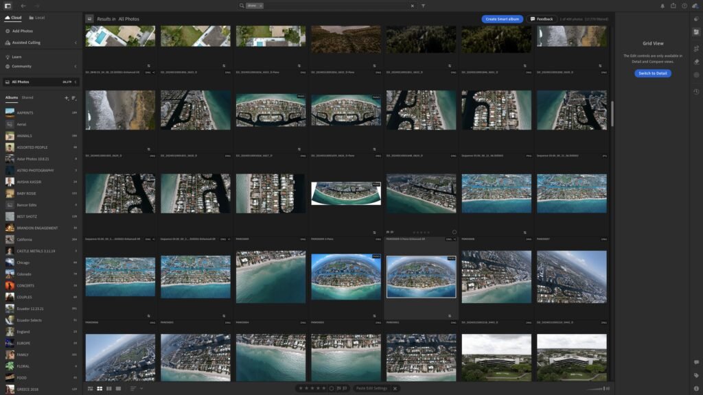 Software screenshot: photo library grid filled with aerial shots of a beachfront island and panorama files