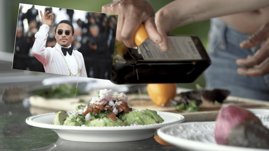 Olive oil poured over a plate of guacamole, with a Salt Bae image composited into the frame as a joke
