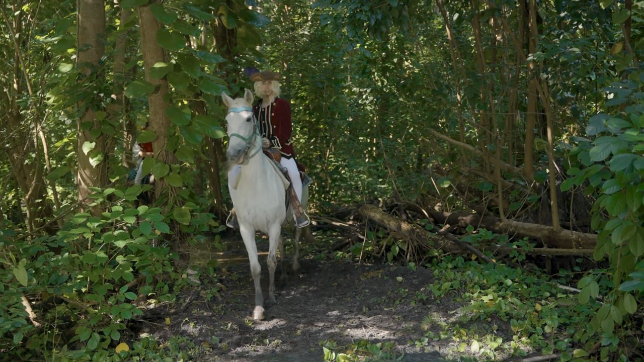 Frame from the SitFit Chair commercial, filmed at Happy Farms
